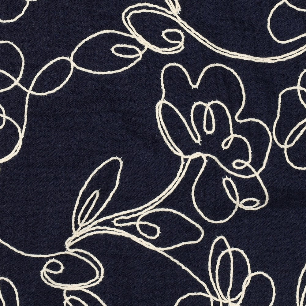 
                  
                    Donkerblauwe double gauze met lichte geborduurde bloemen, double gauze
                  
                
