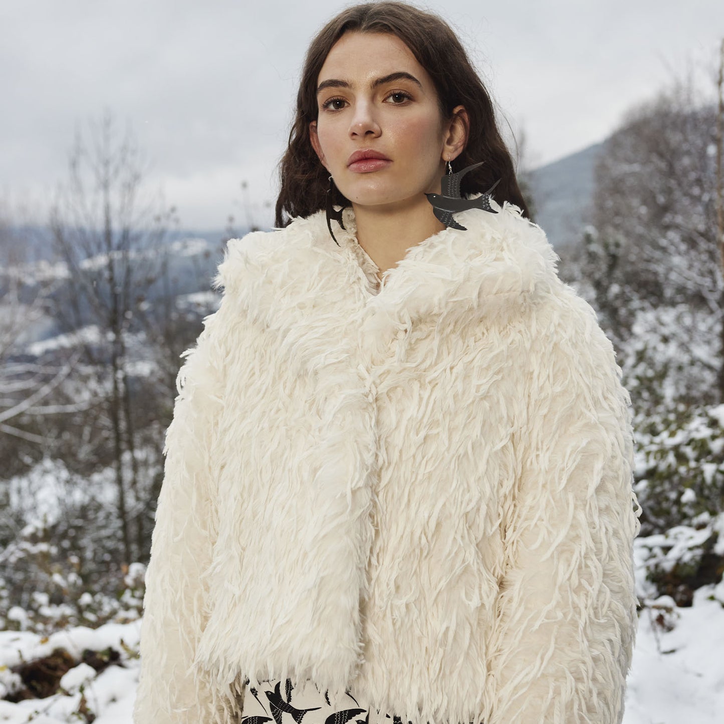 
                  
                    Kortharig imitatiebont met lange veren in ivoor kleur, Katia Fabrics
                  
                