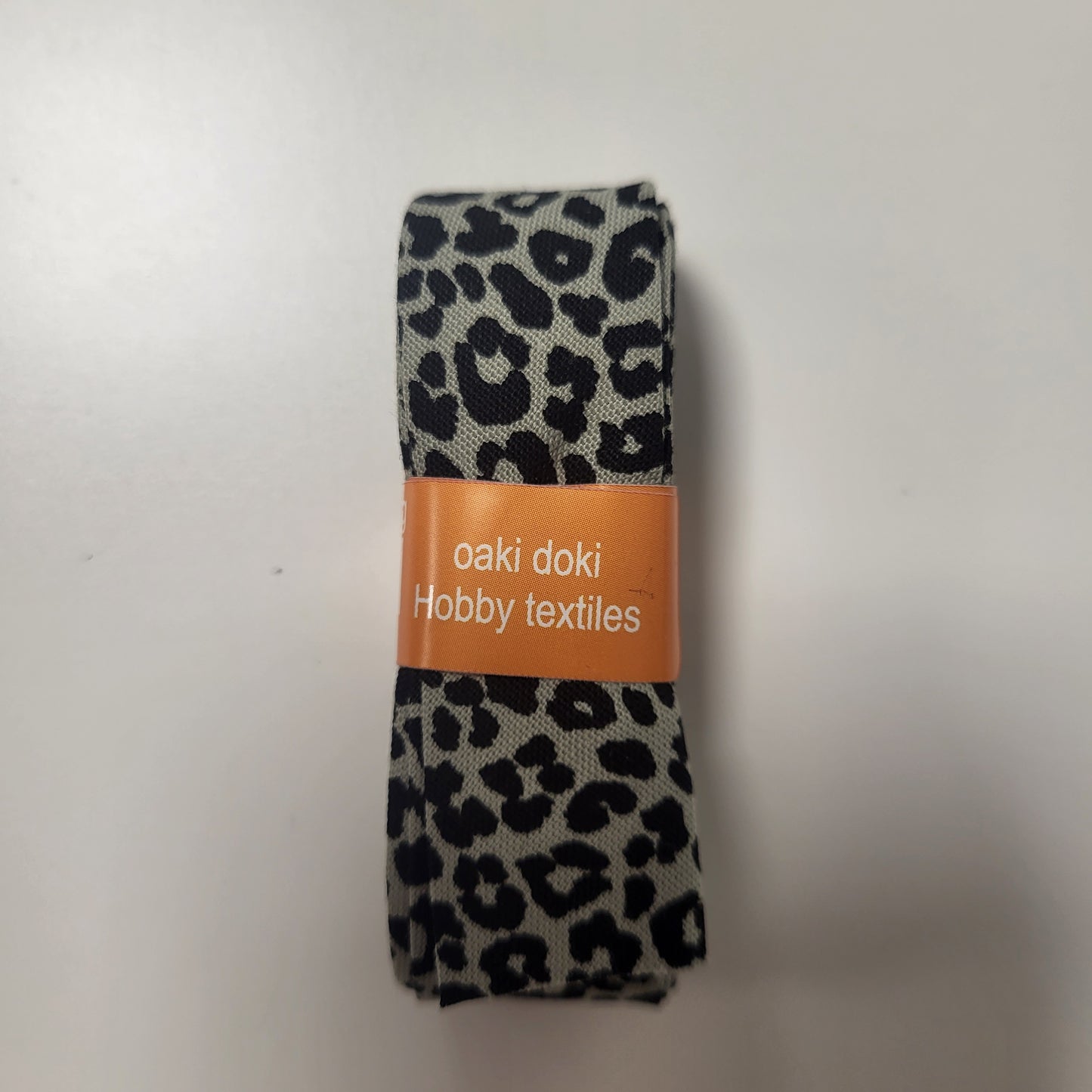 
                  
                    Oaki Doki, biaisband met panterprint
                  
                