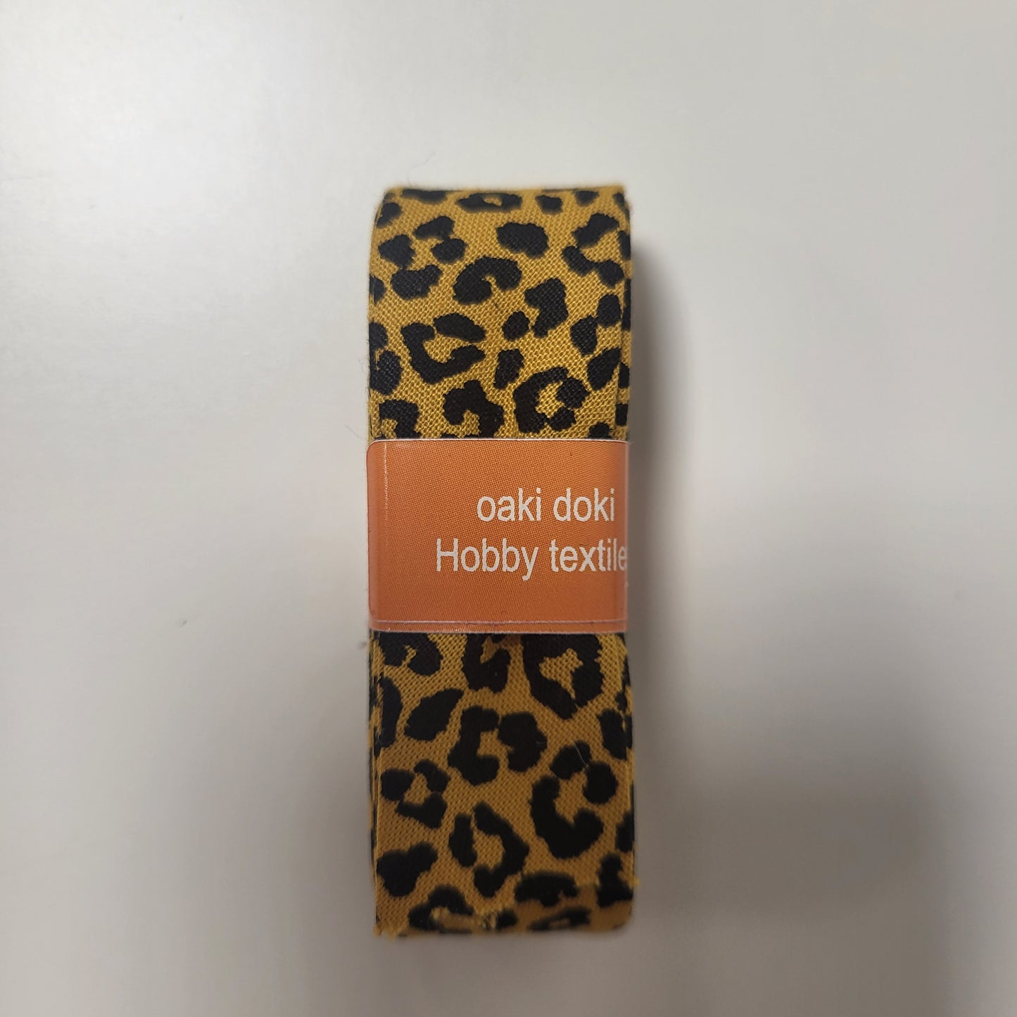 
                  
                    Oaki Doki, biaisband met panterprint
                  
                