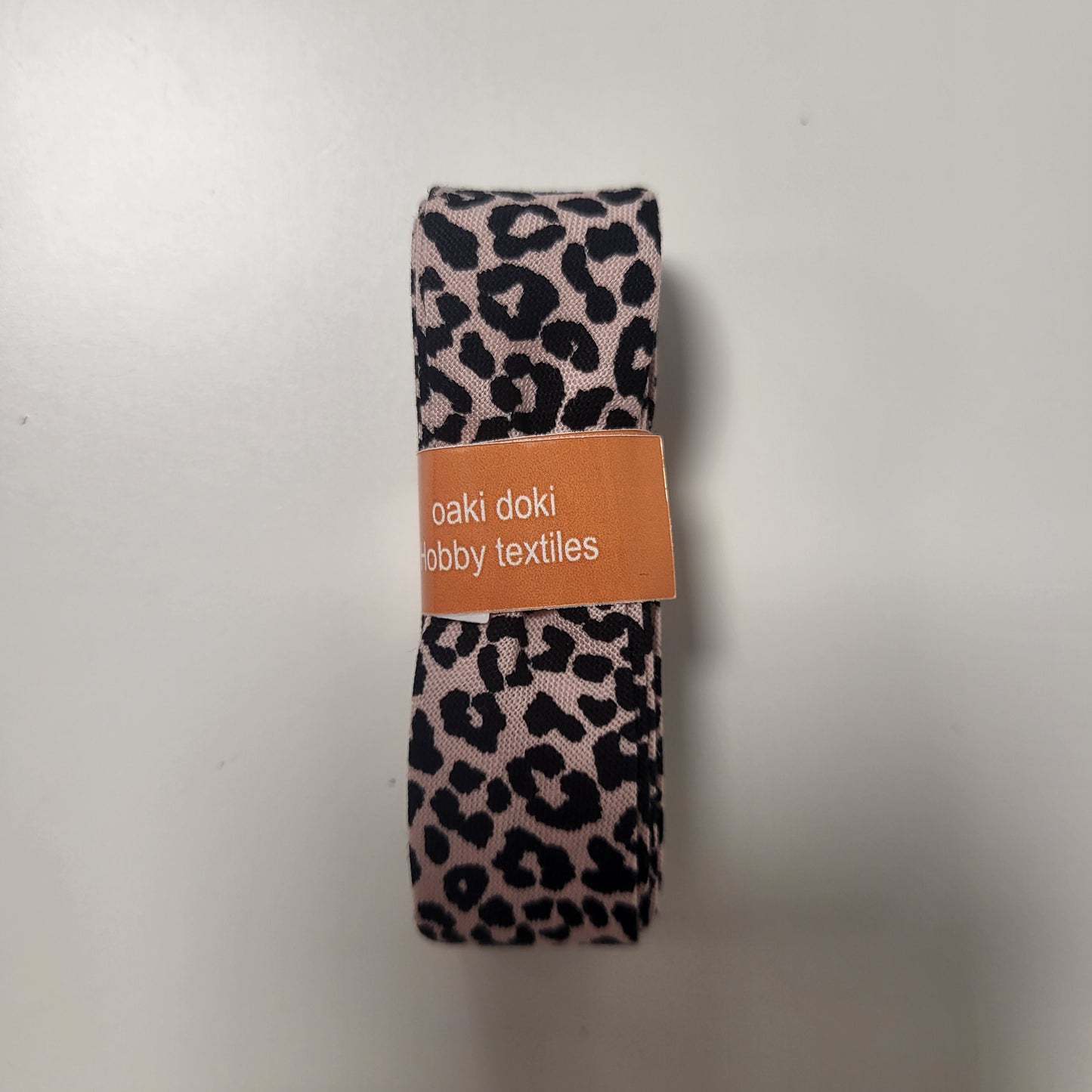 
                  
                    Oaki Doki, biaisband met panterprint
                  
                